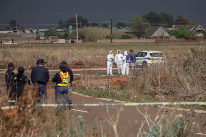 An Image File: Police in South Africa investigate the latest discovery in a series of killings that has left communities around Johannesburg on edge.